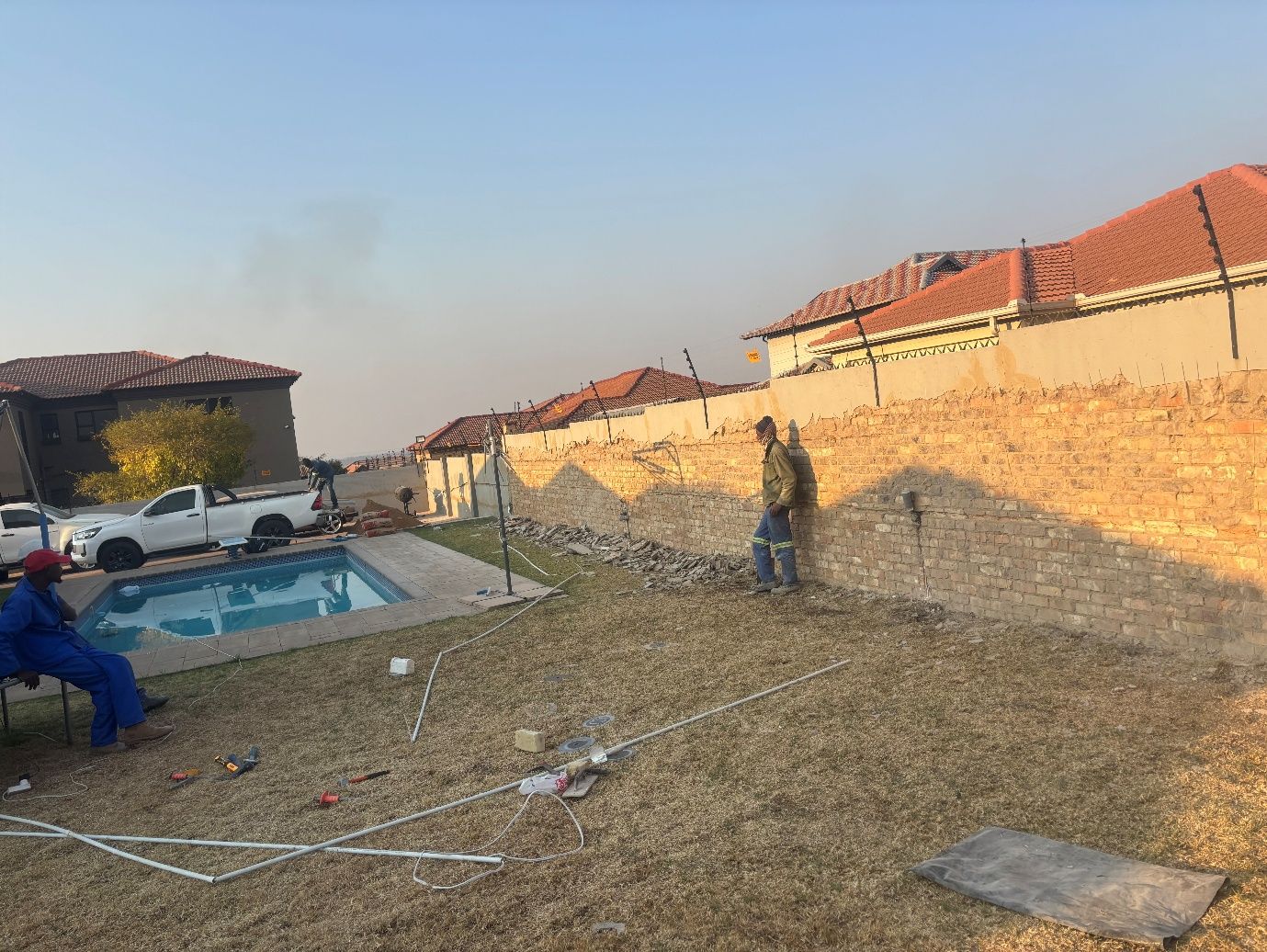 K20 construction team preparing groundworks for a residential pool and yard