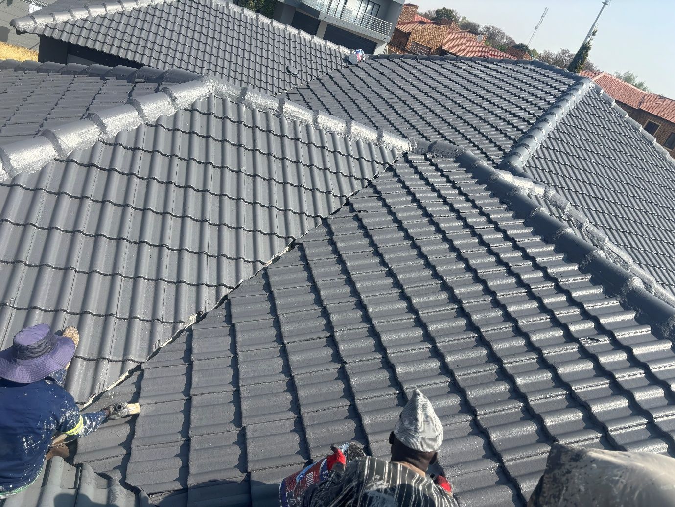 Roof waterproofing and tile work in progress