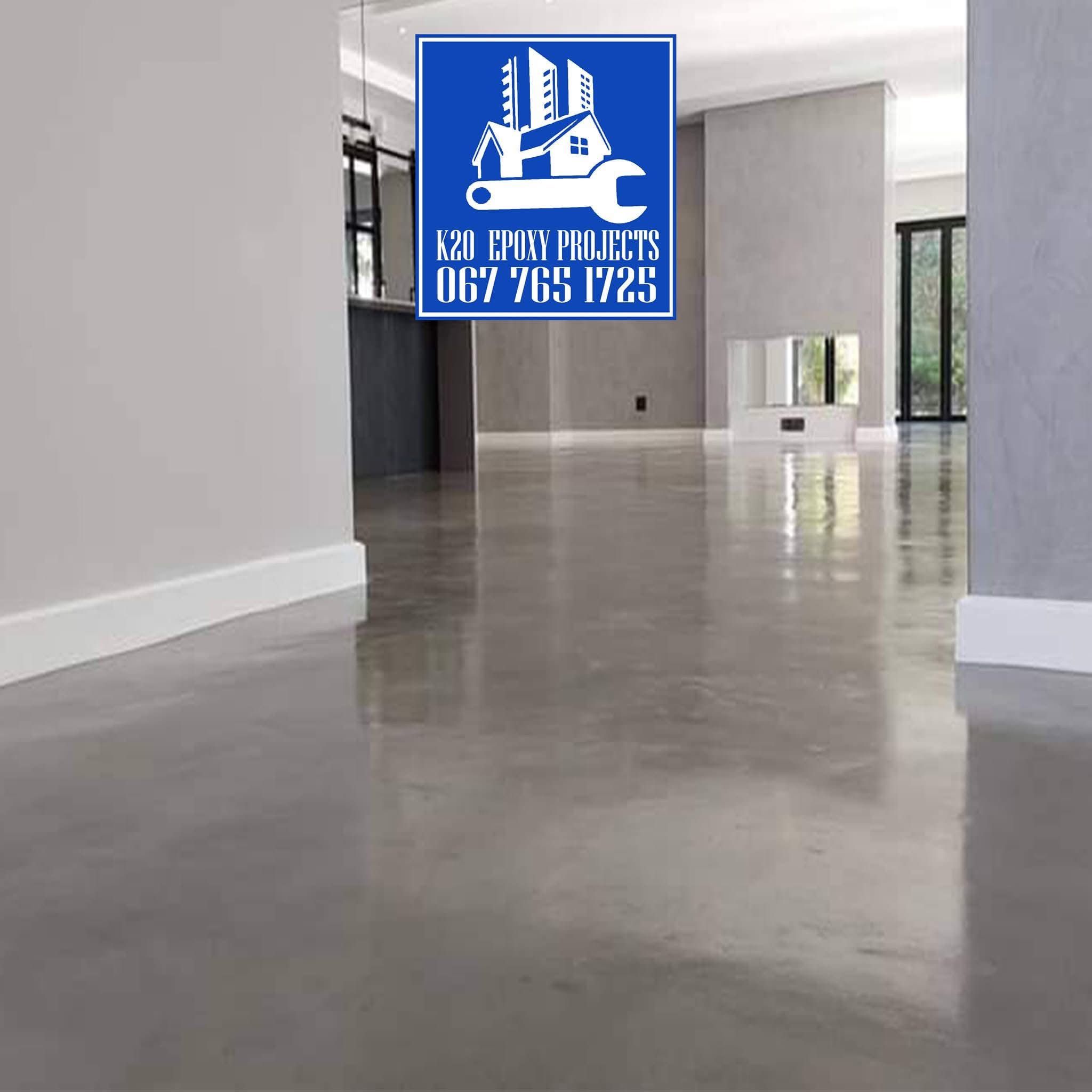 Polished grey screed floor in an empty modern home