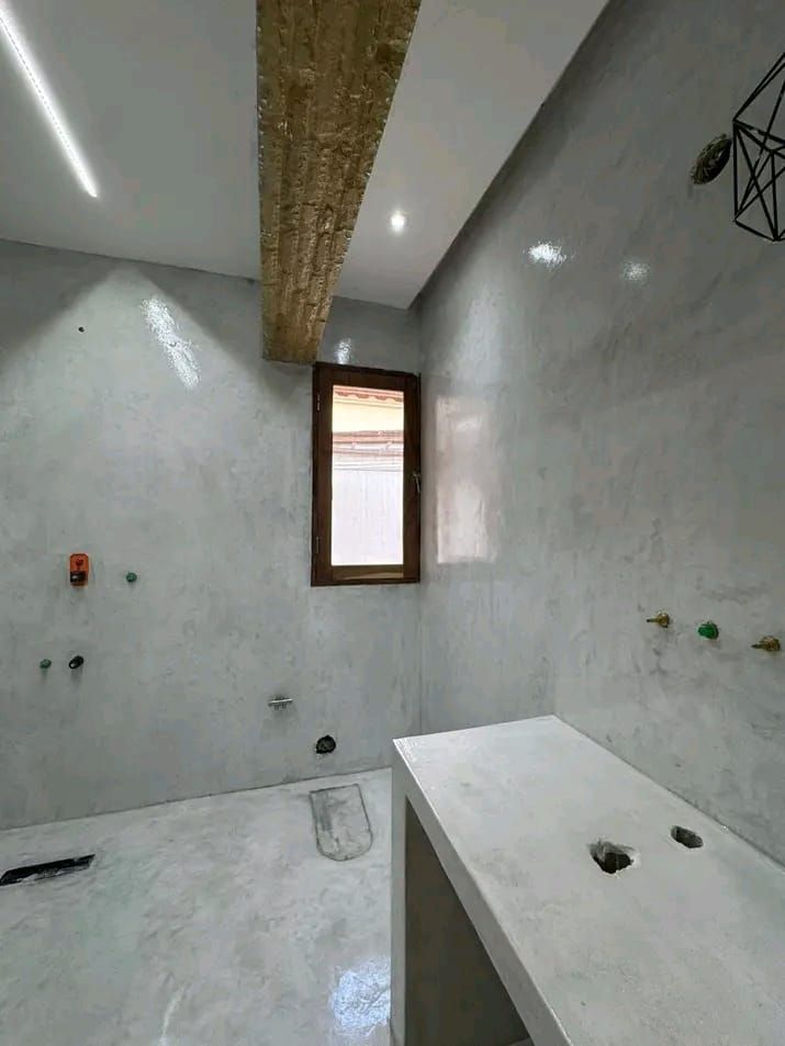 Interior wall with smooth stucco and paint finish
